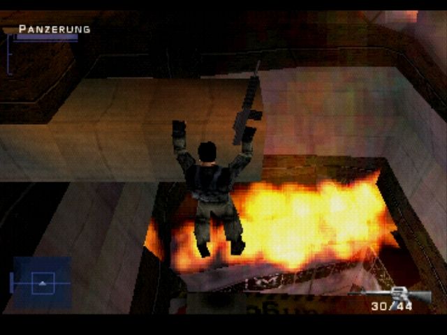 Syphon Filter (1999, PS1) — Gabe Logan to‘siqqa osilib o‘tmoqda.