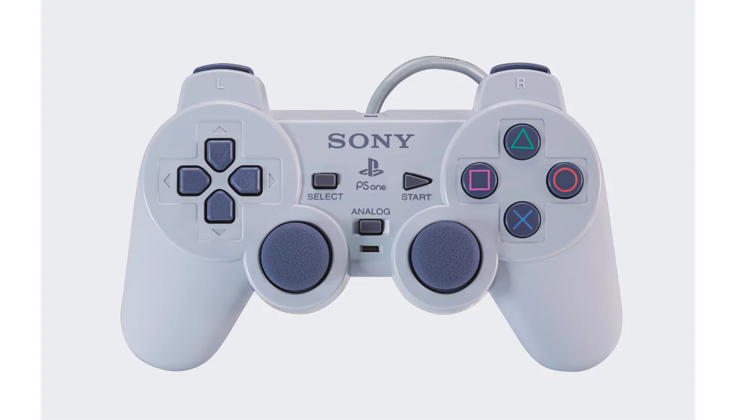 DualShock — ikki analog tayoqchali PS1 pulti